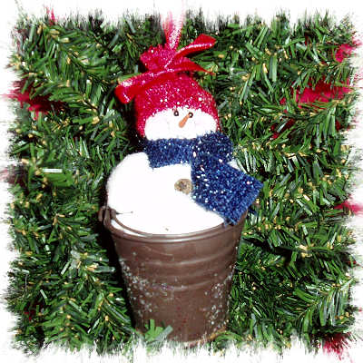 SNOWMAN WITH A PAIL OF SNOWBALL FUN